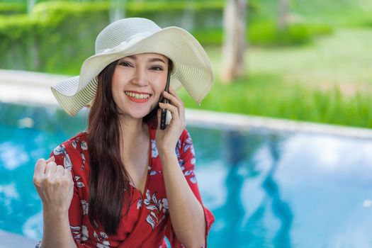 happy beautiful woman talking on a mobile phone 