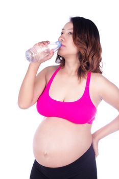 pregnant woman drink water from a bottle isolated on white background