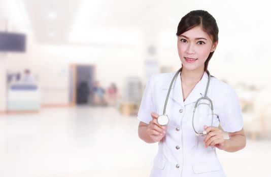 nurse with stethoscope in hospital background