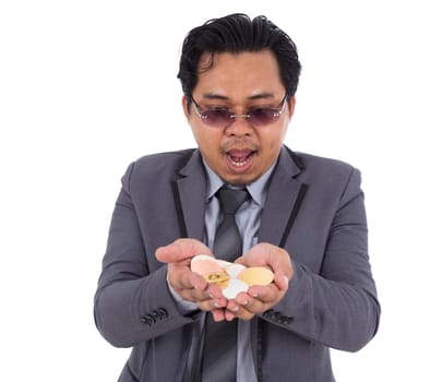 business man surprised with bitcoin in hand isolated on white background