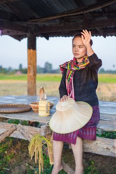 farmer woman sitting in cottage and her tired, Thailand