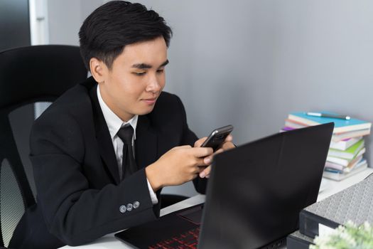 young business man using a smartphone 