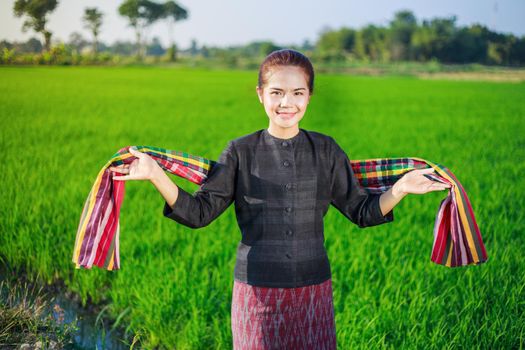 beautiful farmer woman in rice field, Thailand