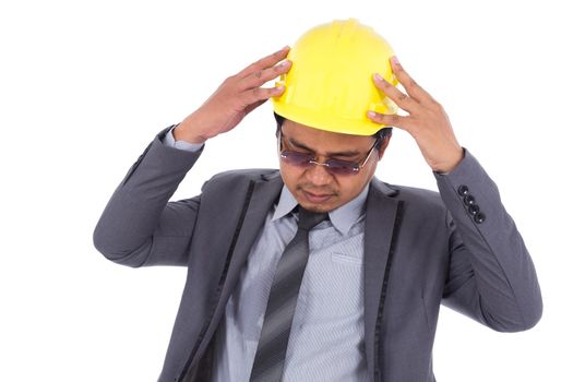 engineer in suit with headache and problems isolated on a white background