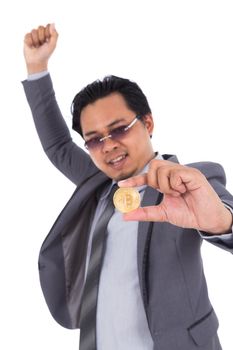 happy man celebrating financial success with a bitcoin isolated on white background