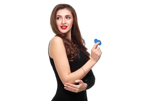 Sexy curly hair brunette in black dress posing with chips in her hands, poker concept isolation on white background Casino, poker, Roulette Blackjack Spin.