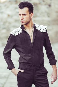 Portrait of attractive man, model of fashion, wearing spanish clothes