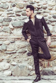 Portrait of attractive man, model of fashion, wearing spanish clothes