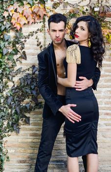 Portrait of beautiful couple, models of fashion, wearing spanish clothes