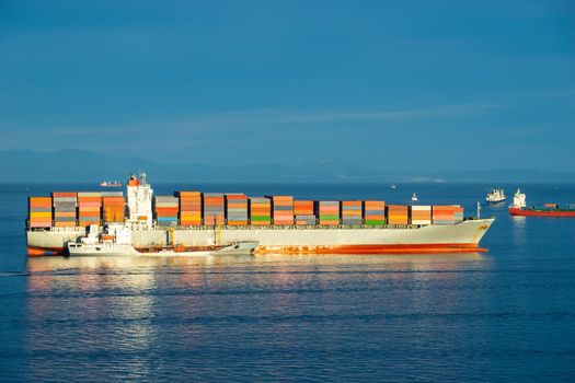 Seascape with a large container ship on the background of the sea. Vladivostok, Russia