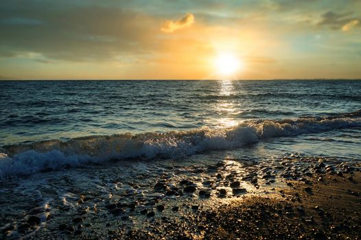 seascape with a beautiful sunset on the background of the sea.