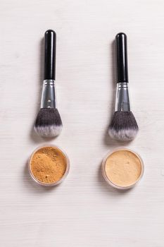 Mineral face powder and brush. Eco-friendly and organic beauty products.