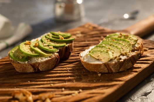 sliced avocado on toast bread with spices.