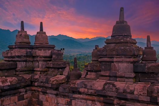 Borobudur Temple in Central Java in Indonesia. This famous Buddhist temple is dating from the 8th and 9th centuries at sunset