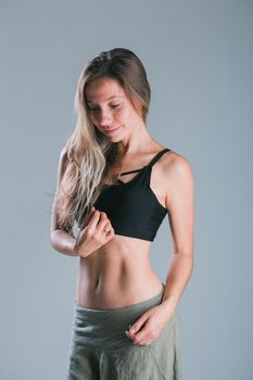 Portrait of young slim fitness woman. Sport and healthy lifestyle concept