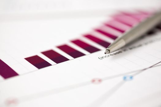 Financial statistics documents ball pen infographics at office table closeup. Internal Revenue Service inspector sum check, investigation, exchange market, earnings, savings, loan and credit concept