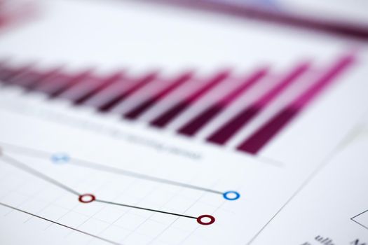 Financial statistics documents on clipboard pad at office table closeup. Internal Revenue Service inspector sum check, irs investigation, exchange market, earnings, savings, loan and credit concept