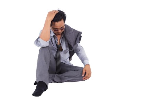 stressed businessman touching his head and thinking isolated on white background