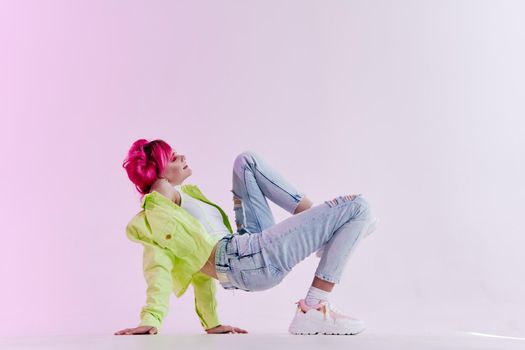 woman with pink hair youth style posing lifestyle neon. High quality photo