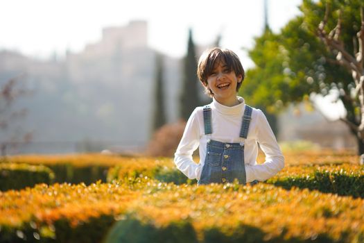 Eight-year-old girl having fun in an urban park in Granada