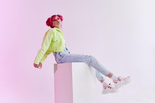 fashionable woman pink hair posing fashion clothes Acid style design. High quality photo