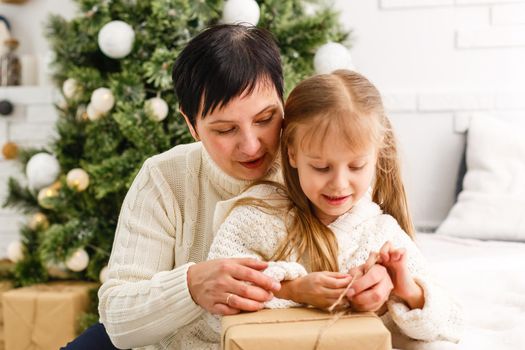 mother and children at home for christmas.