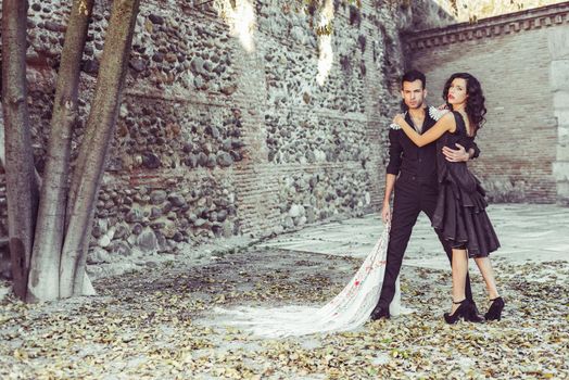 Portrait of beautiful couple, models of fashion, wearing spanish clothes