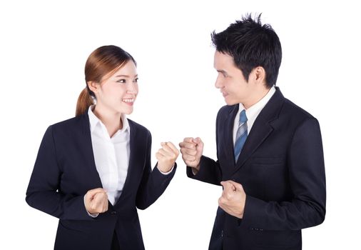 Successful business man and woman with arm raised isolated on white background