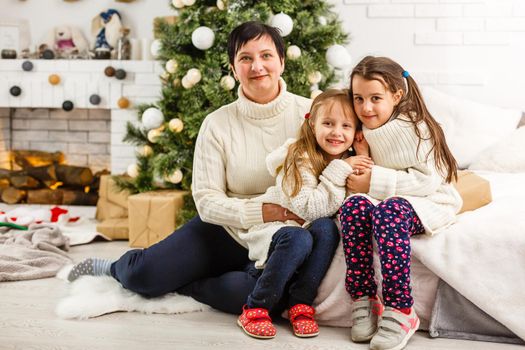 friendly family in Christmas morning.