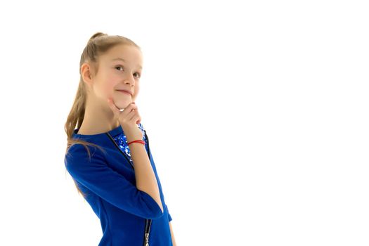 A charming little girl folded her hands around her face. The concept of beauty and fashion, children's emotions. Isolated on white background.