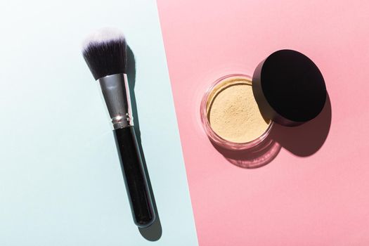 Mineral face powder and brush. Eco-friendly and organic beauty products.