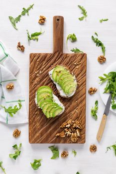 sliced avocado on toast bread with spices.