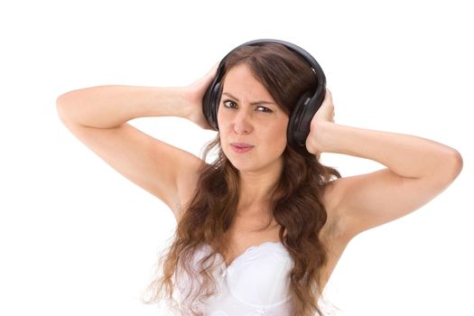 Attractive Sexy woman with beautiful body posing with headphones, isolated on white.