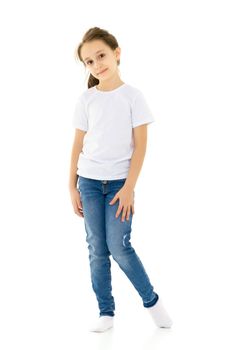 Pretty Stylish Girl with Ponytail Standing Half Turn, Cute Child in Blank White Shirt and Blue Jeans Smiling at the Camera, Pretty Girl Posing on Isolated White Background