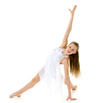 Graceful Girl Gymnast Performing Rhythmic Gymnastics Exercise, Sportive Girl Dancing Wearing White Sport Dress, Beautiful Long Haired Teenager Posing in Studio Against White Background