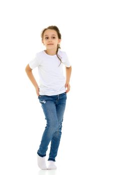 Pretty Stylish Girl with Ponytail Standing Half Turn, Cute Child in Blank White Shirt and Blue Jeans Smiling at the Camera, Pretty Girl Posing on Isolated White Background