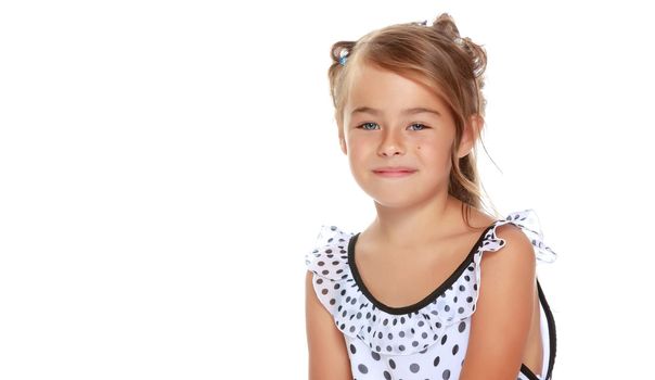 Beautiful little girl close-up. The concept of beauty and fashion, happy childhood. Isolated on white background.