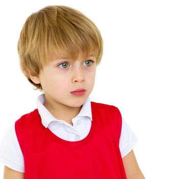 Smiling little boy, studio portrait on white background. The concept of a happy childhood, well-being in the family. Close-up. Isolated.