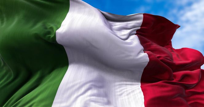 Detail of the national flag of Italy flying in the wind. Democracy and politics. European country.