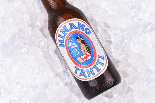 IRVINE, CALIFORNIA - AUGUST 26, 2016: Hinano Beer on ice. Brewed on the French Polynesian Island of Tahiti, the name comes from the white flower of the Pandanus plant.