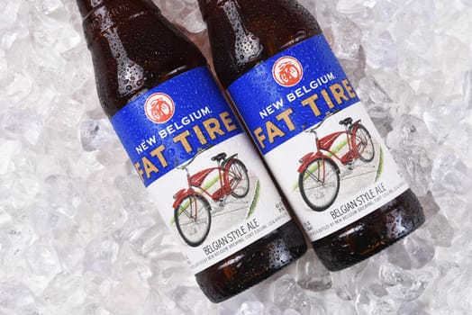 IRVINE, CALIFORNIA - December 14, 2017: Fat Tire Amber Ale bottles on ice. From the New Belgium Brewing Company, of Fort Collins, Colorado.