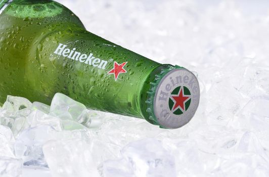 IRVINE, CA - MAY 29, 2017: Heineken Beer bottle on ice. Since 1975, most Heineken beer has been brewed at the brewery in Zoeterwoude, Netherlands.