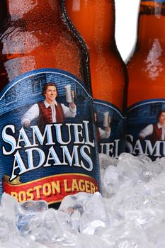 IRVINE, CA - MAY 30, 2014: Closeup of bottles of Samuel Adams Boston Lager in ice. Brewed by the Boston Beer Company one of the largest American-owned beermakers.