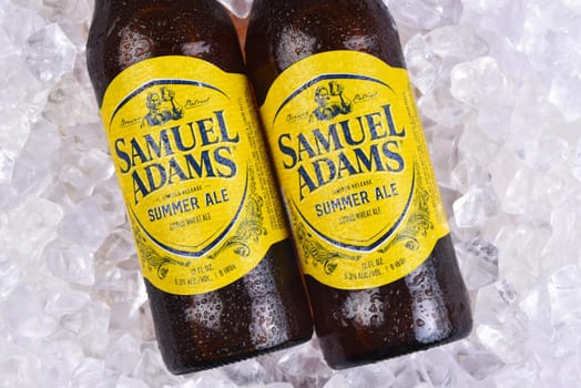 IRVINE, CALIFORNIA - 09 AUG 2020: Closeup of two bottes of Samuel Adams Summer Ale on a bed of ice. 