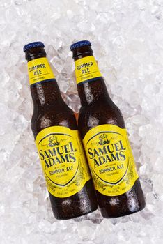 IRVINE, CALIFORNIA - 09 AUG 2020: Two bottes of Samuel Adams Summer Ale on a bed of ice. 