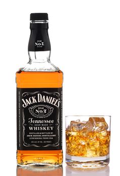 IRVINE, CALIFORNIA - DEC 28, 2018: A bottle of Jack Daniels Tennessee Whiskey, with glass, from Lynchburg, Tennessee, is the top selling American Whiskey in the world.