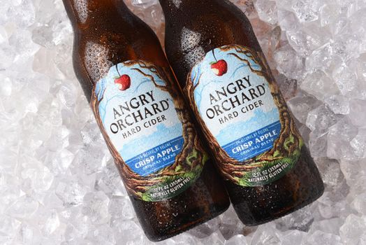 IRVINE, CALIFORNIA - OCTOBER 19, 2018: Two bottles of Angry Orchard Crisp Apple Hard Cider on a bed of ice.