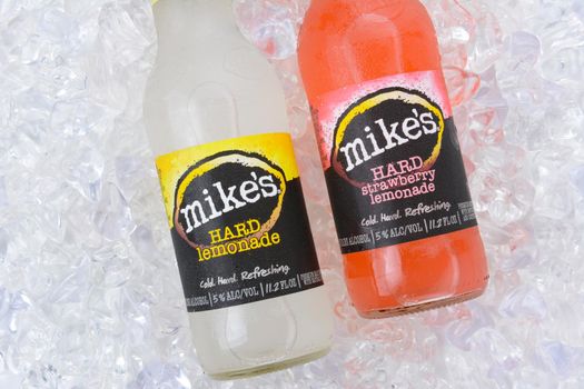 IRVINE, CA - AUGUST 15, 2016: Two bottles of Mikes Hard Lemonade on ice. Mikes produces a line of alcoholic lemonades in various fruit flavors.