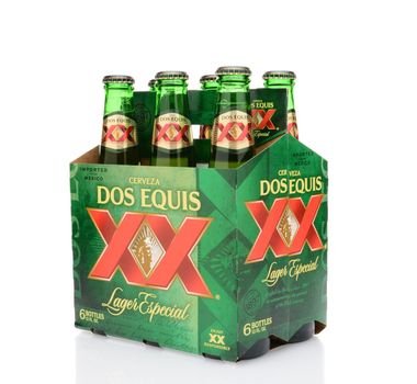 IRVINE, CA - MAY 25, 2014: A three quarters view of a 6 pack of Dos Equis Lager Especial. Founded in 1890 from the Cuauhtemoc-Moctezuma Brewery in Monterrey, Mexico a subsidary of Heineken International.