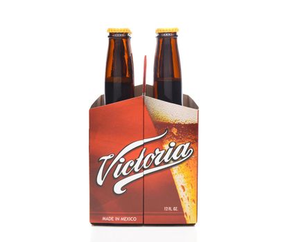 IRVINE, CALIFORNIA - DECEMBER 14, 2017: 6 pack  of Victoria Beer Bottles end view. Mexicos oldest beer brand. Victoria has been brewed consistently as a Vienna style lager for 145 years. 